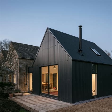 black and white metal house|homes with metal siding photos.